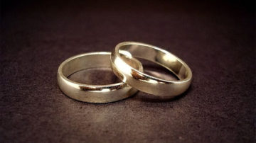 A couple of 14-carat gold wedding rings. Autore Jeff Belmonte dal Cuiabá, Brazil