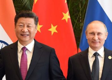Il presidente cinese Xi Jinping, e il presidente russo Vladimir Putin, foto di GovernmentZA, da Flickr