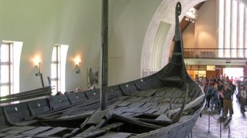 The preserved remains of the Oseberg Ship, now located in the Viking Ship Museum (Oslo). By Hofi0006 - Own work, CC BY-SA 3.0, https://commons.wikimedia.org/w/index.php?curid=268551