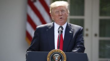 Il presidente Trump annuncia l’uscita dall’accordo di Parigi sul clima, foto della Casa Bianca, Washington, 1 giugno 2017